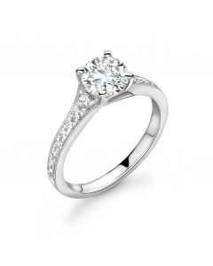 Platinum brilliant round cut single stone ring with diamond shouldrs. 0.76cts
