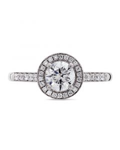 Platinum brilliant round cut diamond halo engagement ring. 0.70cts