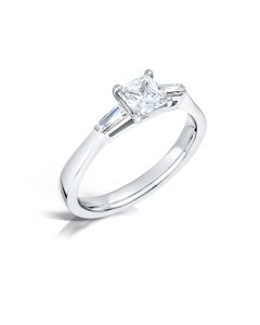 Platinum princess cut single stone engagement ring with baguette shoulders. 0.73cts