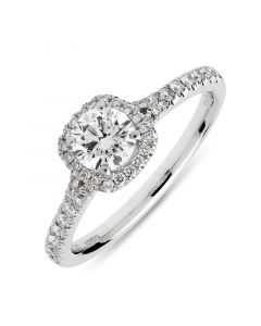 Platinum brilliant round cut diamond halo engagement ring. 0.50cts