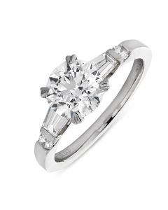 Platinum brilliant round cut single stone ring with diamond shouldrs. 1.51cts