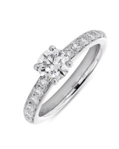Platinum brilliant round cut diamond engagement ring with diamond shoulders. 0.75cts