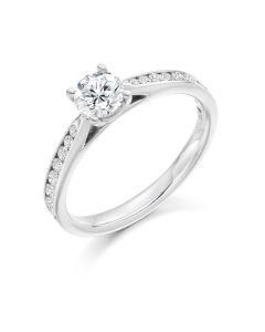 Platinum brilliant round cut single stone ring with diamond shoulders. 0.57cts