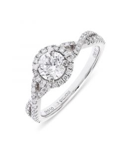 Platinum brilliant round cut diamond halo engagement ring. 0.55cts