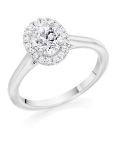 Platinum oval cut diamond halo engagement ring. 0.70cts