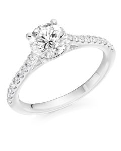Platinum single stone brilliant round cut diamond engagement ring with diamond shoulders. 1.00cts
