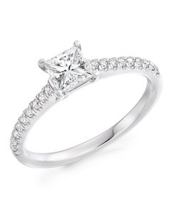 Platinum princess cut diamond single stone engagement ring with diamond shoulders. 0.72cts