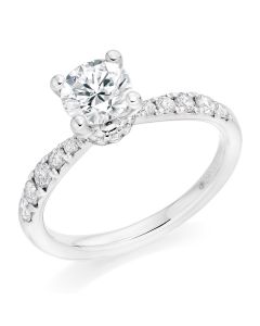 Platinum brilliant round cut diamond engagement ring with diamond shoulders. 0.80cts