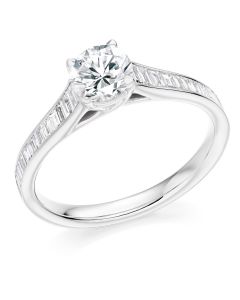 Platinum brilliant round cut diamond engagement ring with baguette diamond shoulders. 0.70cts