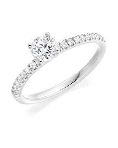 Platinum brilliant round cut diamond single stone engagement ring with diamond shoulders. 0.70cts