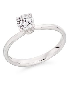 Platinum brilliant round cut diamond engagement ring with hidden halo. 0.50cts