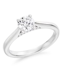 Platinum brilliant round cut diamond single stone engagement ring with diamond gallery.