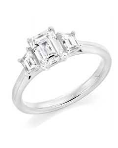 Platinum emerald cut diamond trilogy engagement ring. 1.00cts