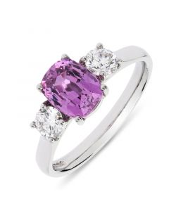 Platinum oval cut pink sapphire and diamond engagement ring.